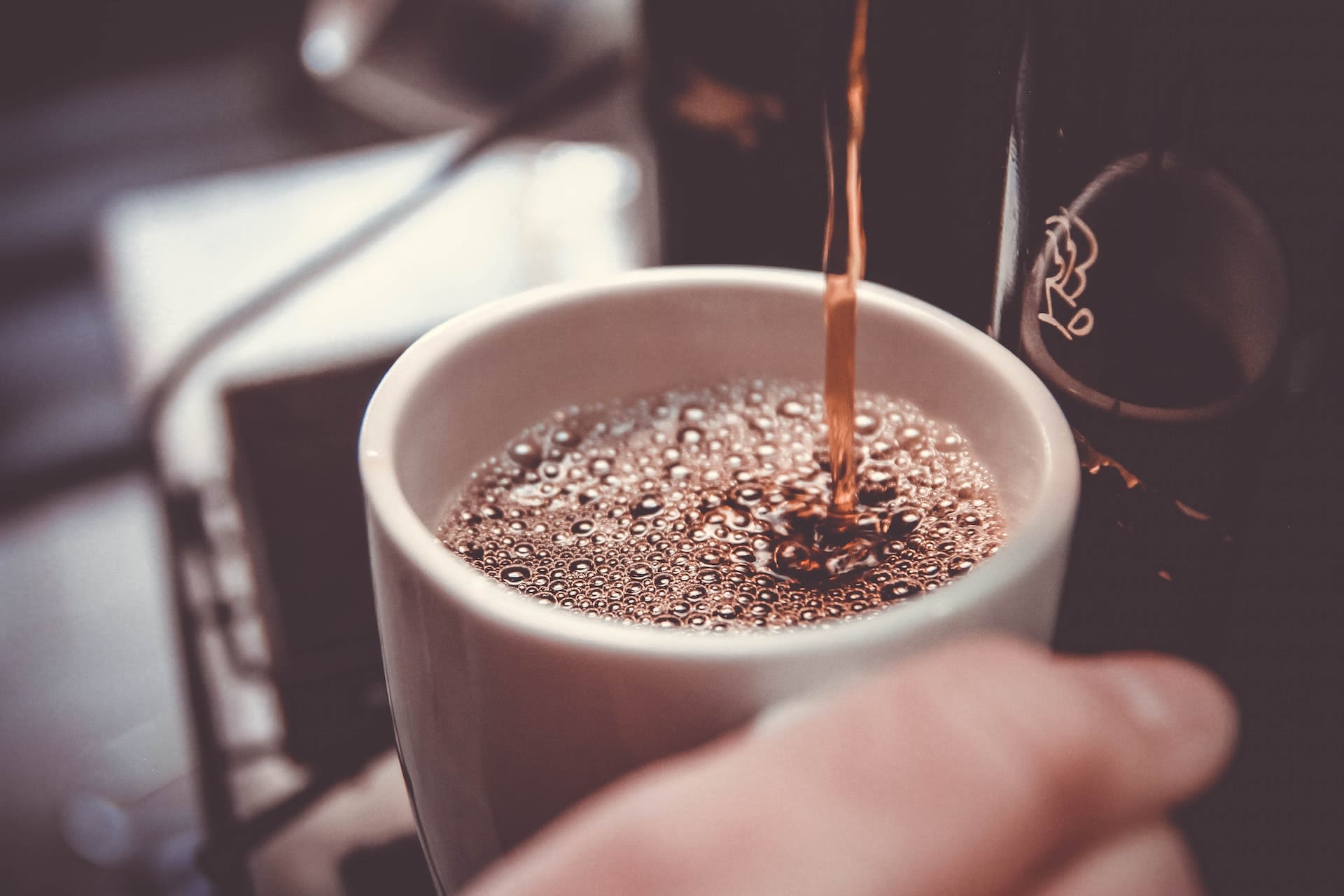 Coffee pouring into mug