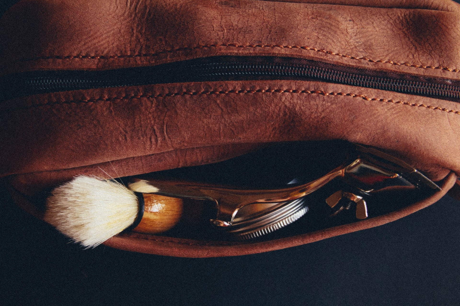 Shaving kit in a brown leather bag