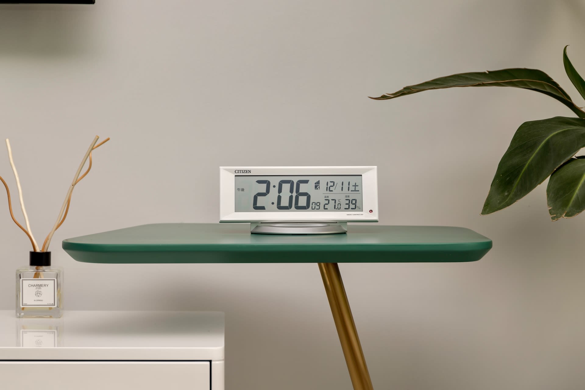 Digital alarm clock on desk