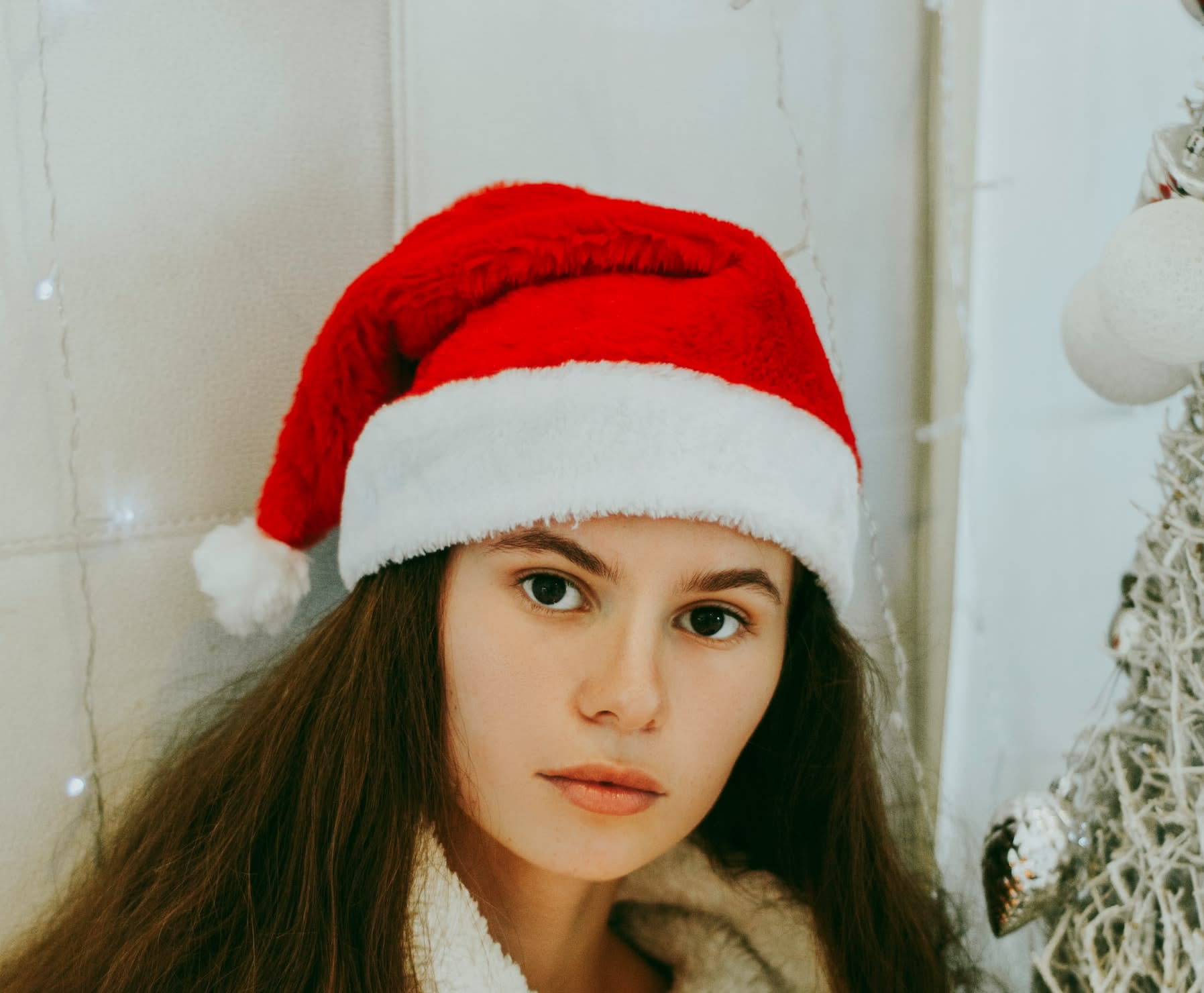 Woman wearing christmas hat