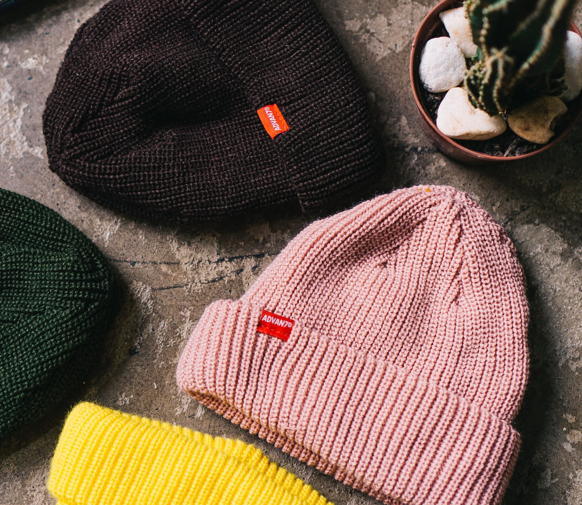 Selection of flat lay second-hand beanie hats