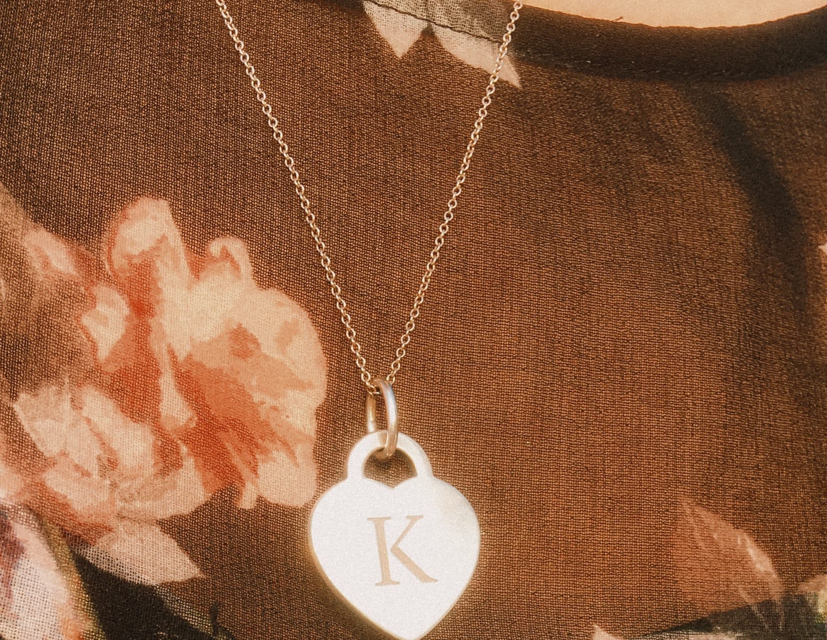 'K' heart shaped initial necklace