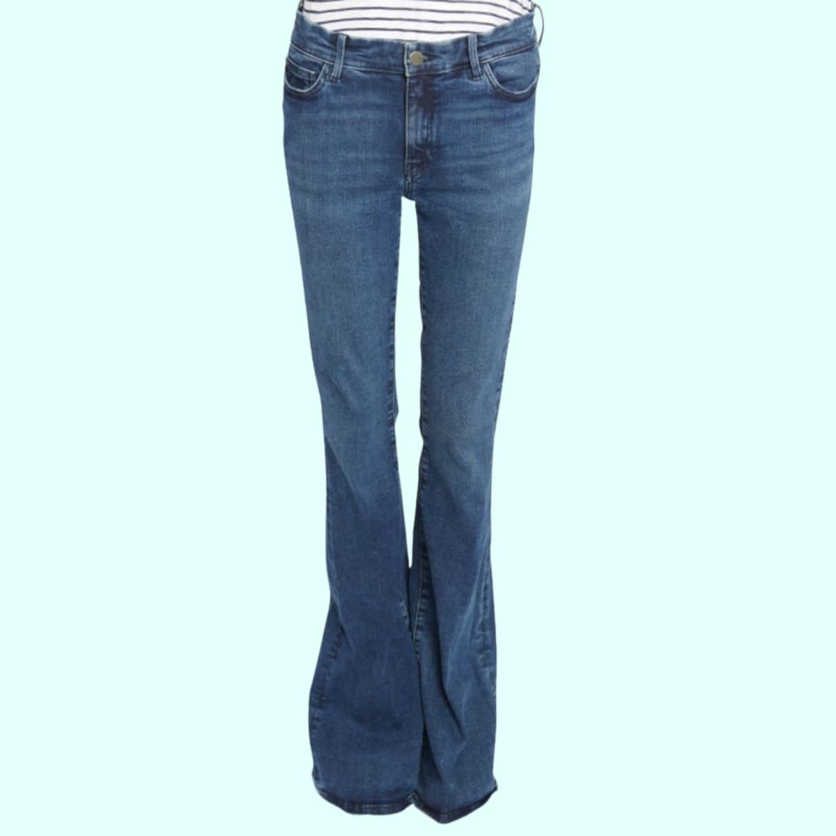 High rise flared jeans on blue background