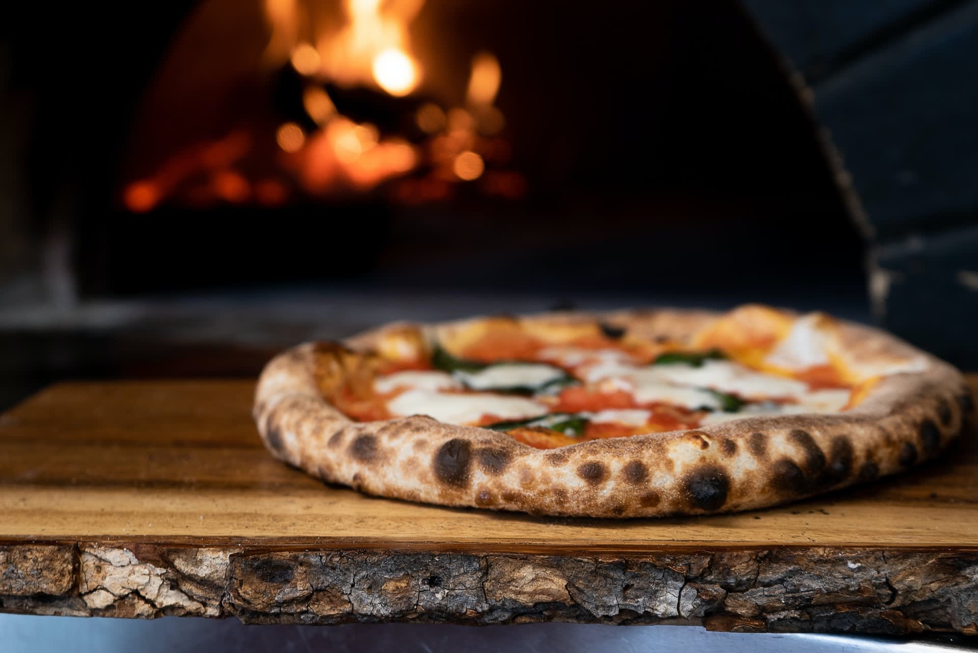 Wood fired pizza in pizza oven