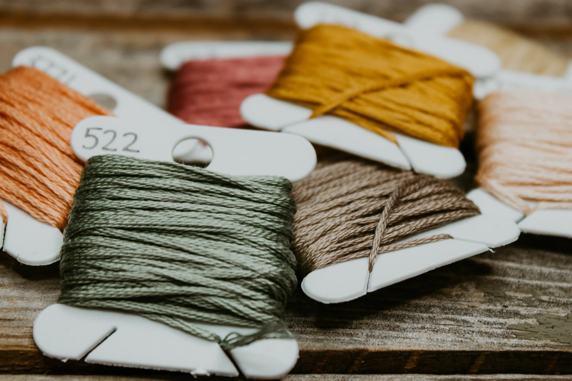 Neutral toned embroidery threads