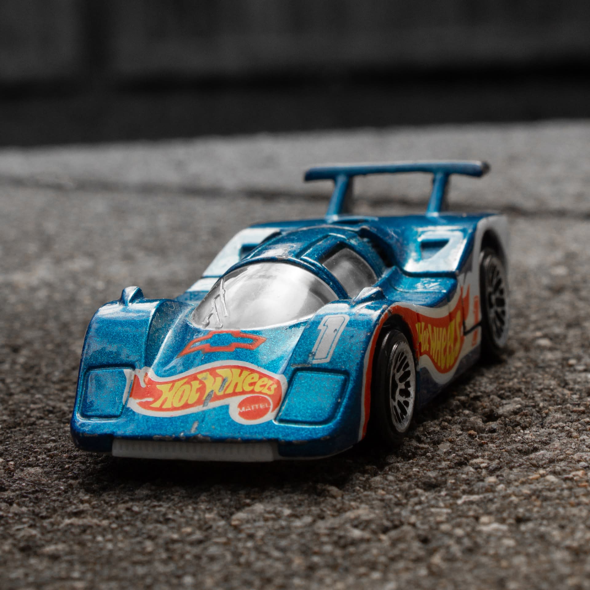 Close up of a blue hot wheels car