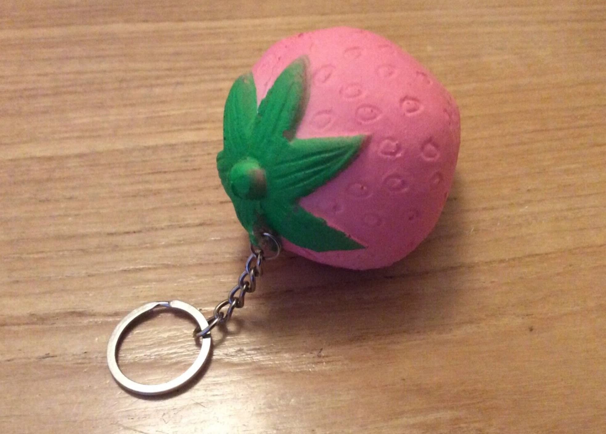 Pink strawberry stress ball keyring