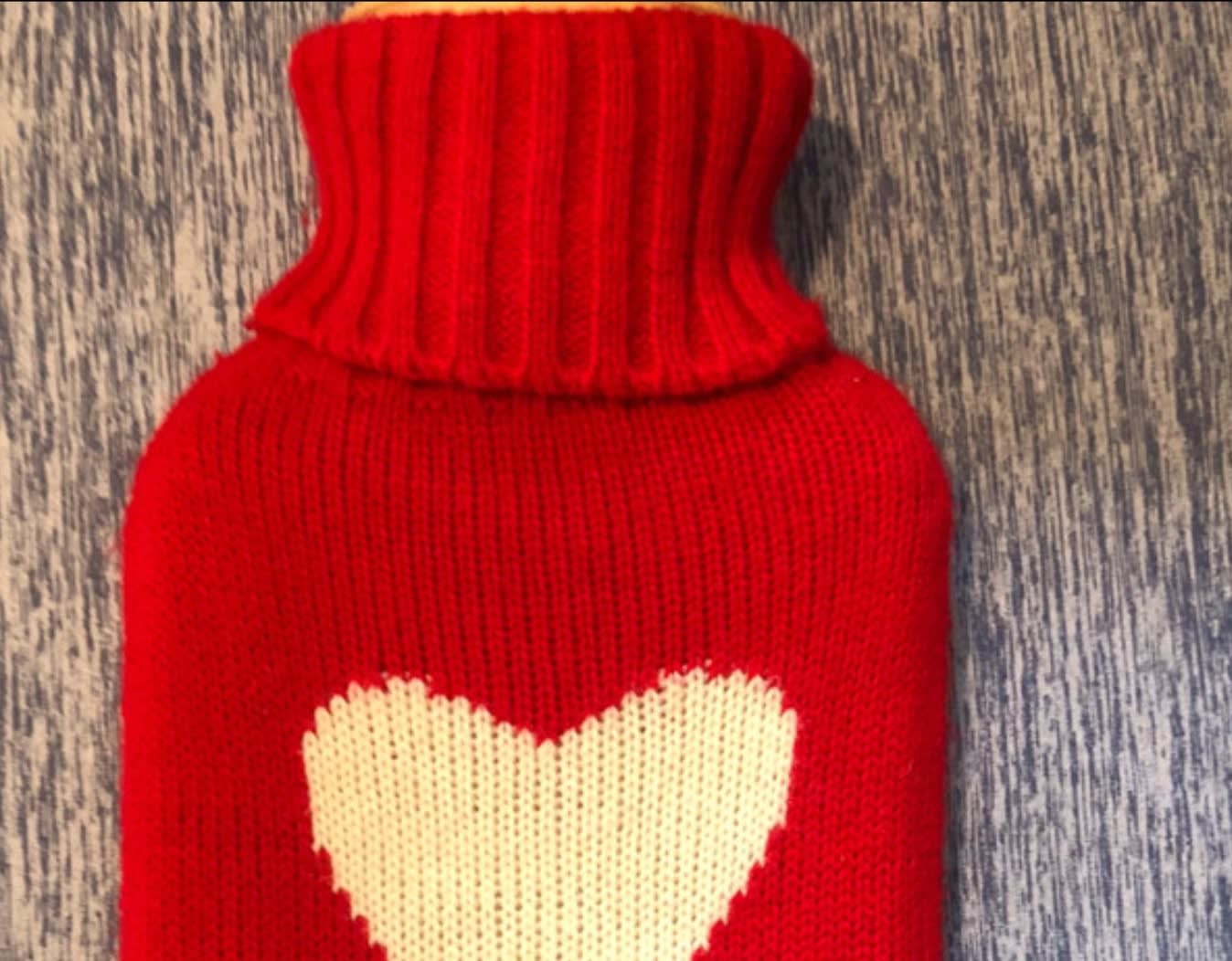 Red covered hot water bottle