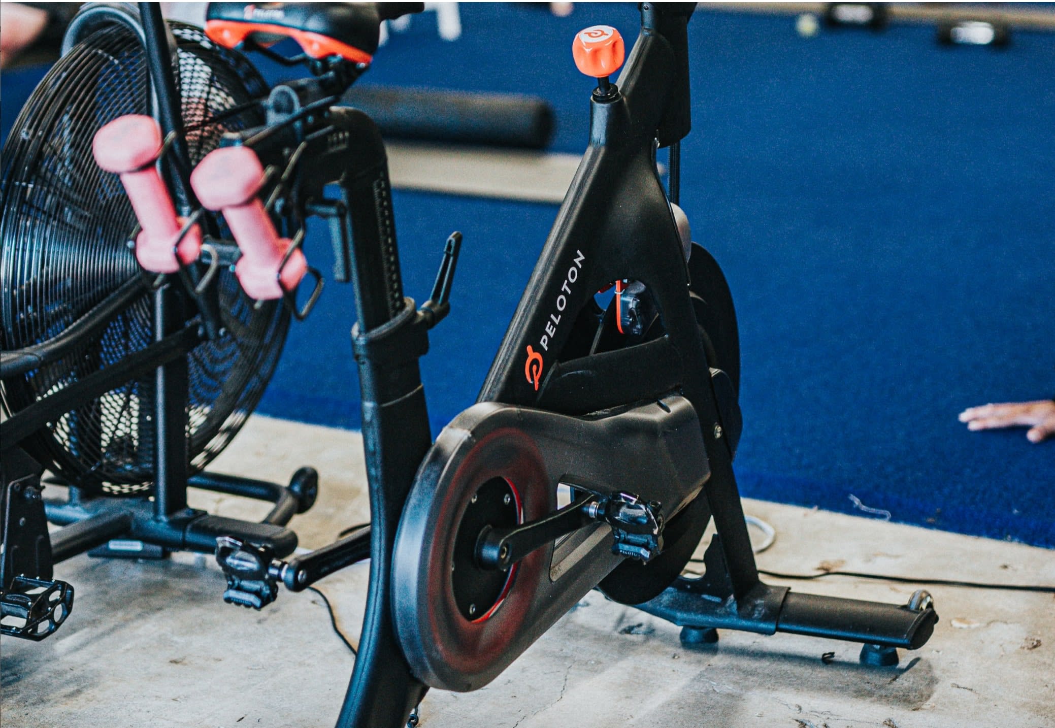 Black used spin bike set up at gym