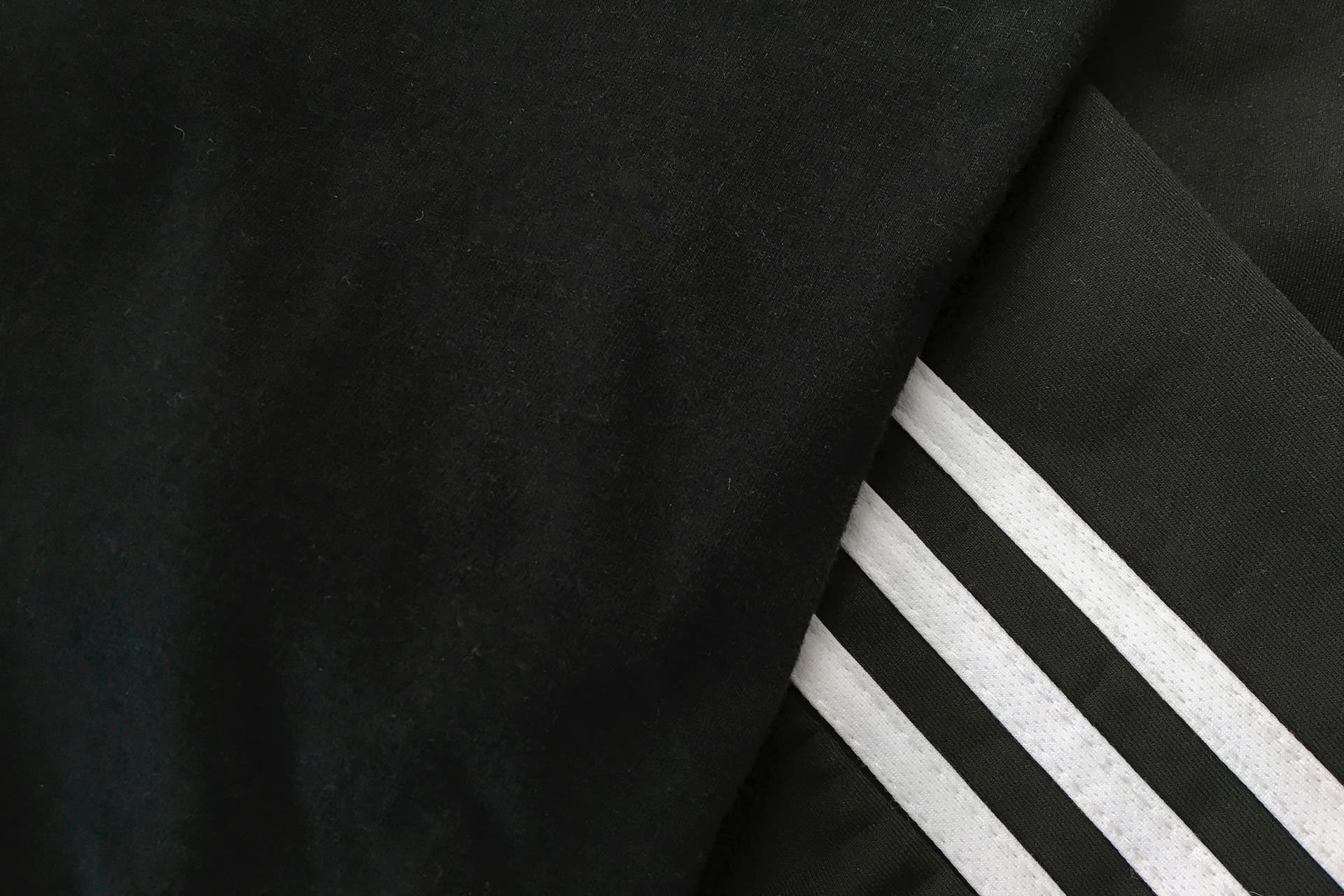 Black and white second hand Adidas trousers