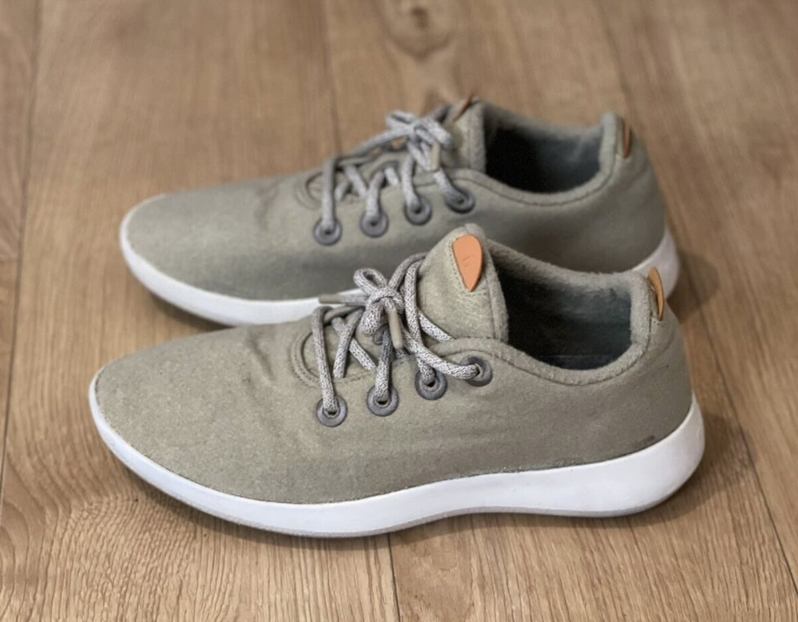 Khaki pair of second hand Allbirds trainers