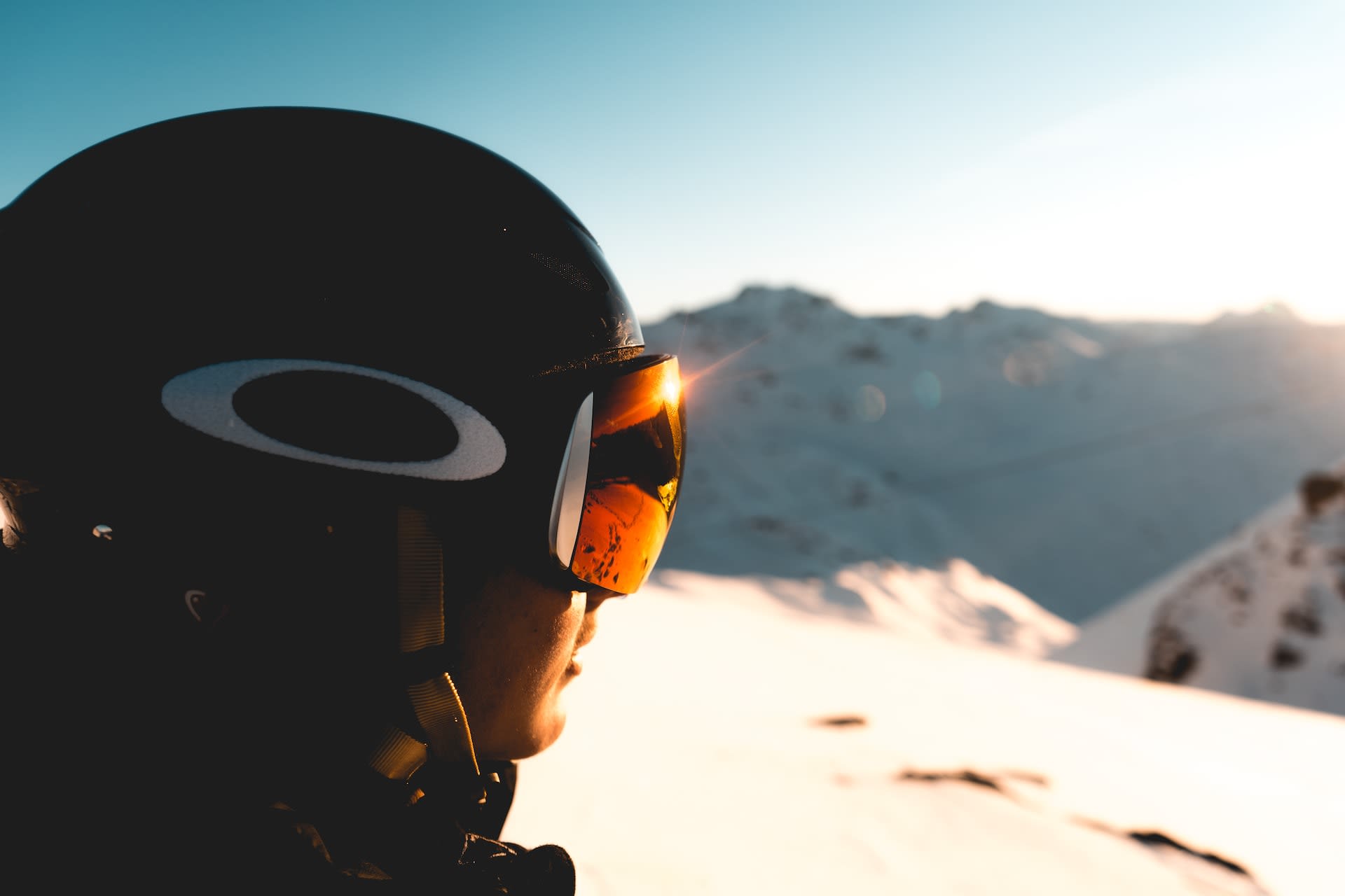 Person wearing Oakley ski goggles on mountain