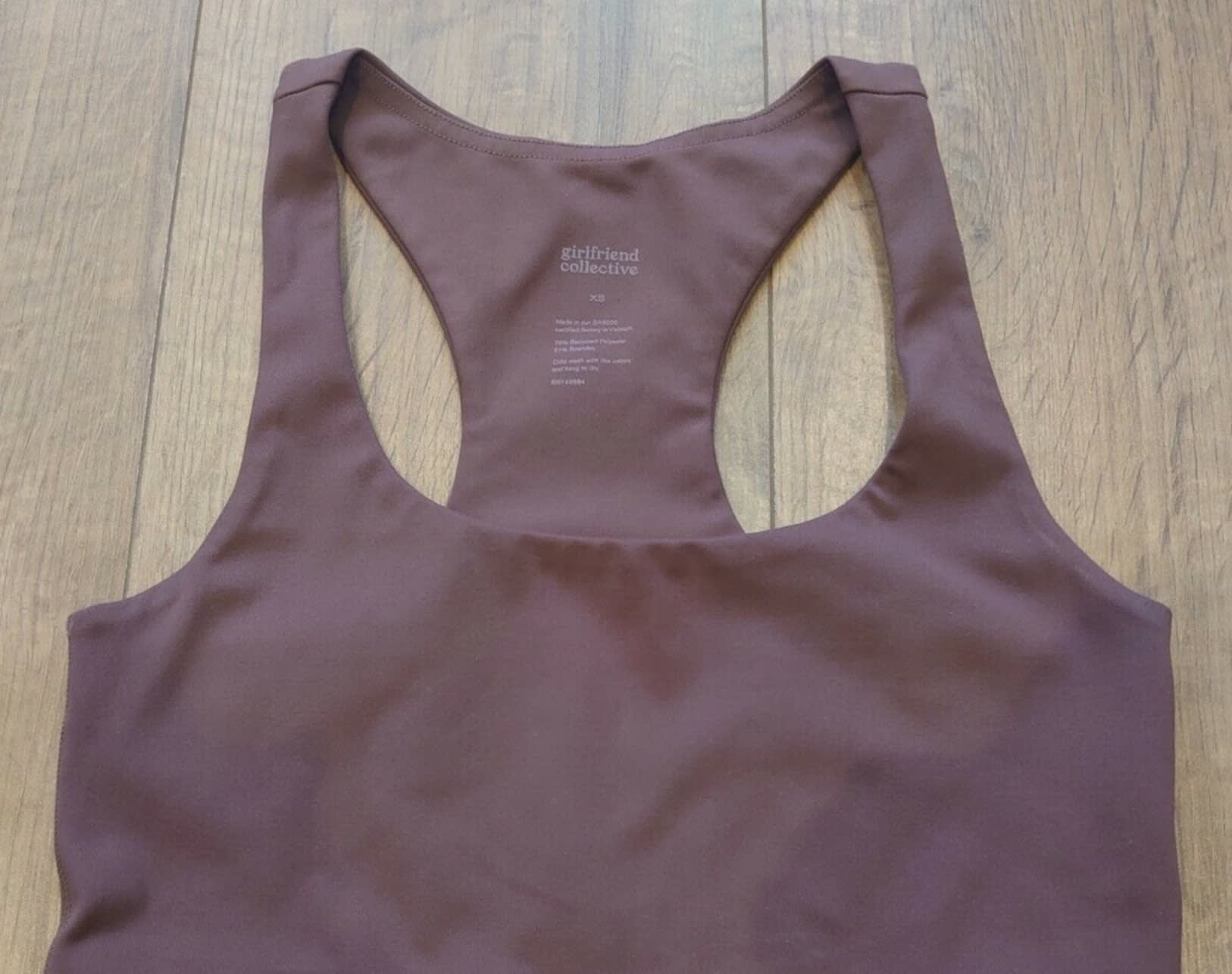 Brown used and loved Girlfriend Collective sports bra