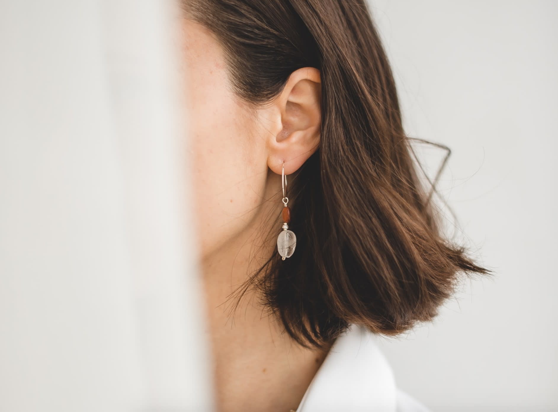 Bride wearing sea glass drop earrings