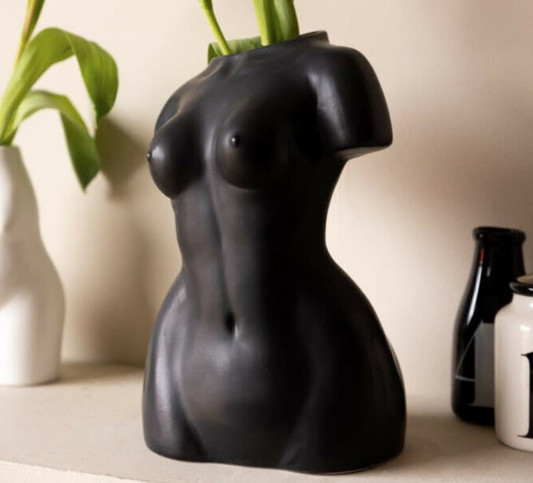 Pre-loved vase shaped like female form