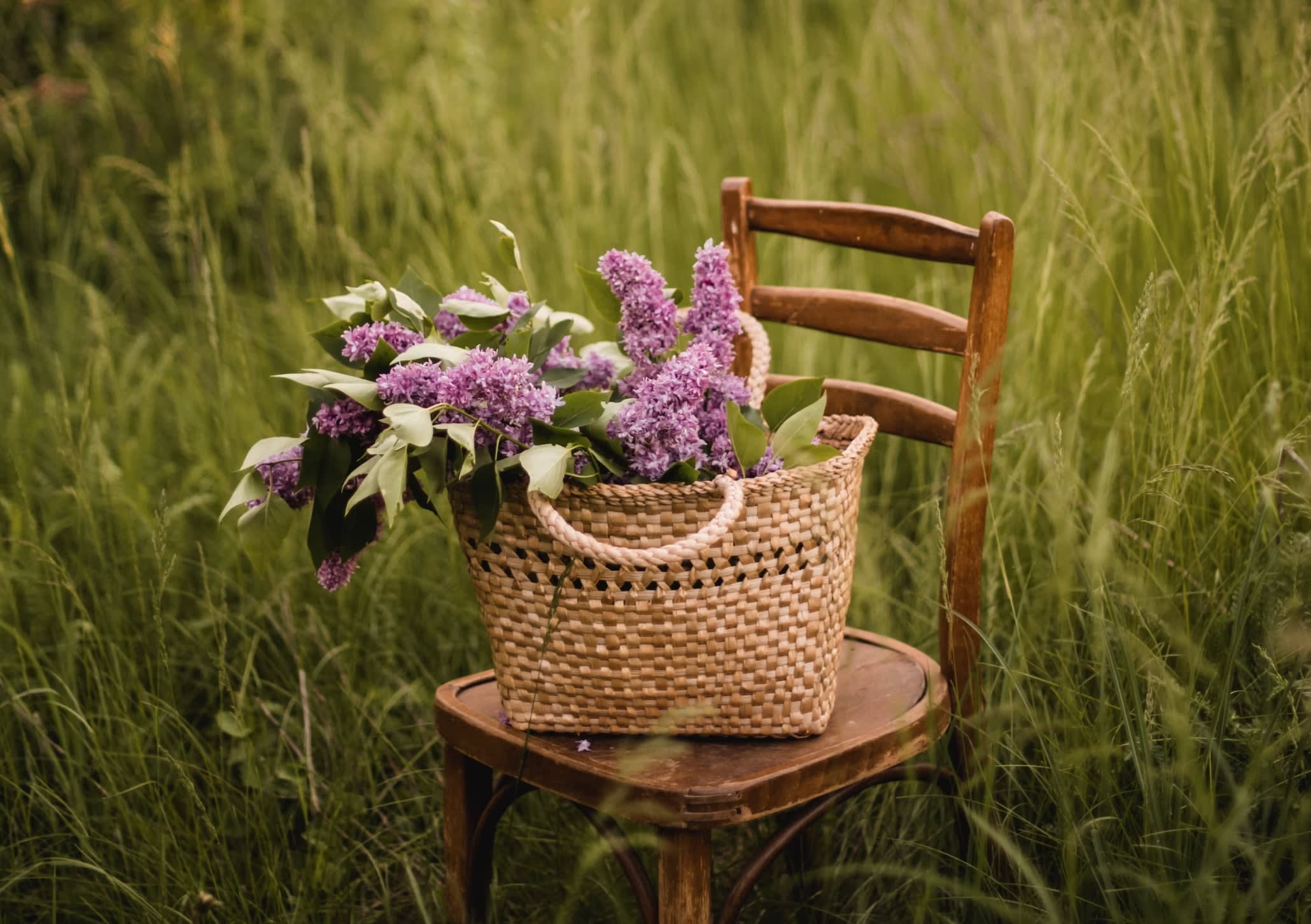 vintage straw bag filled with flowers