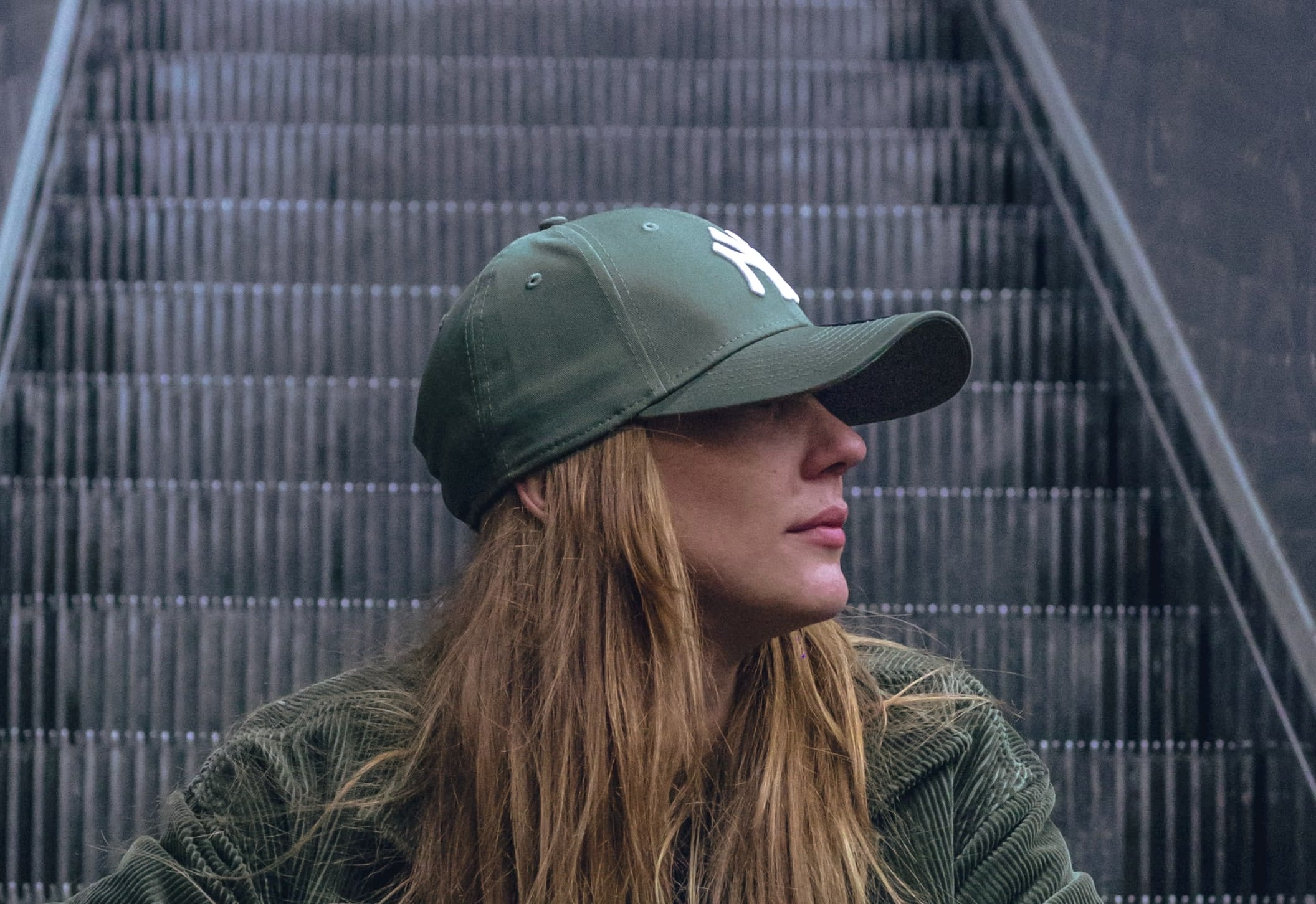 Woman wearing a second-hand New York Yankees Baseball cap