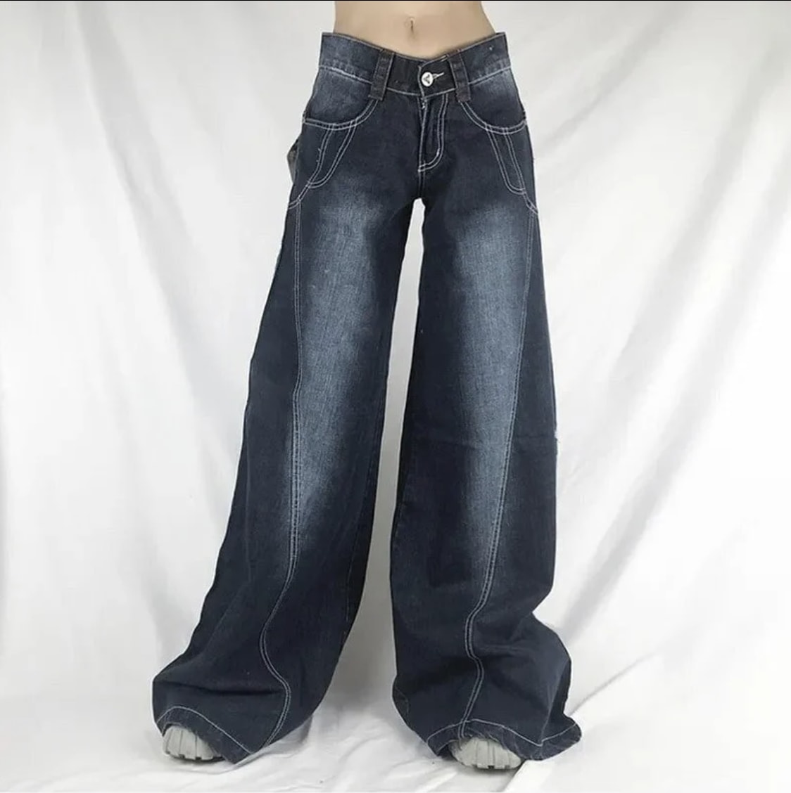 a pair of low rise wide leg jeans in a dark wash