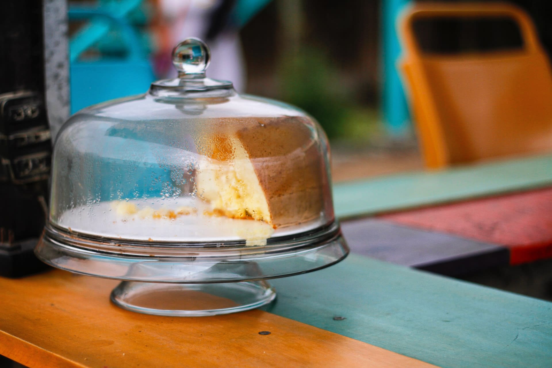 glass food cover on a colourful table