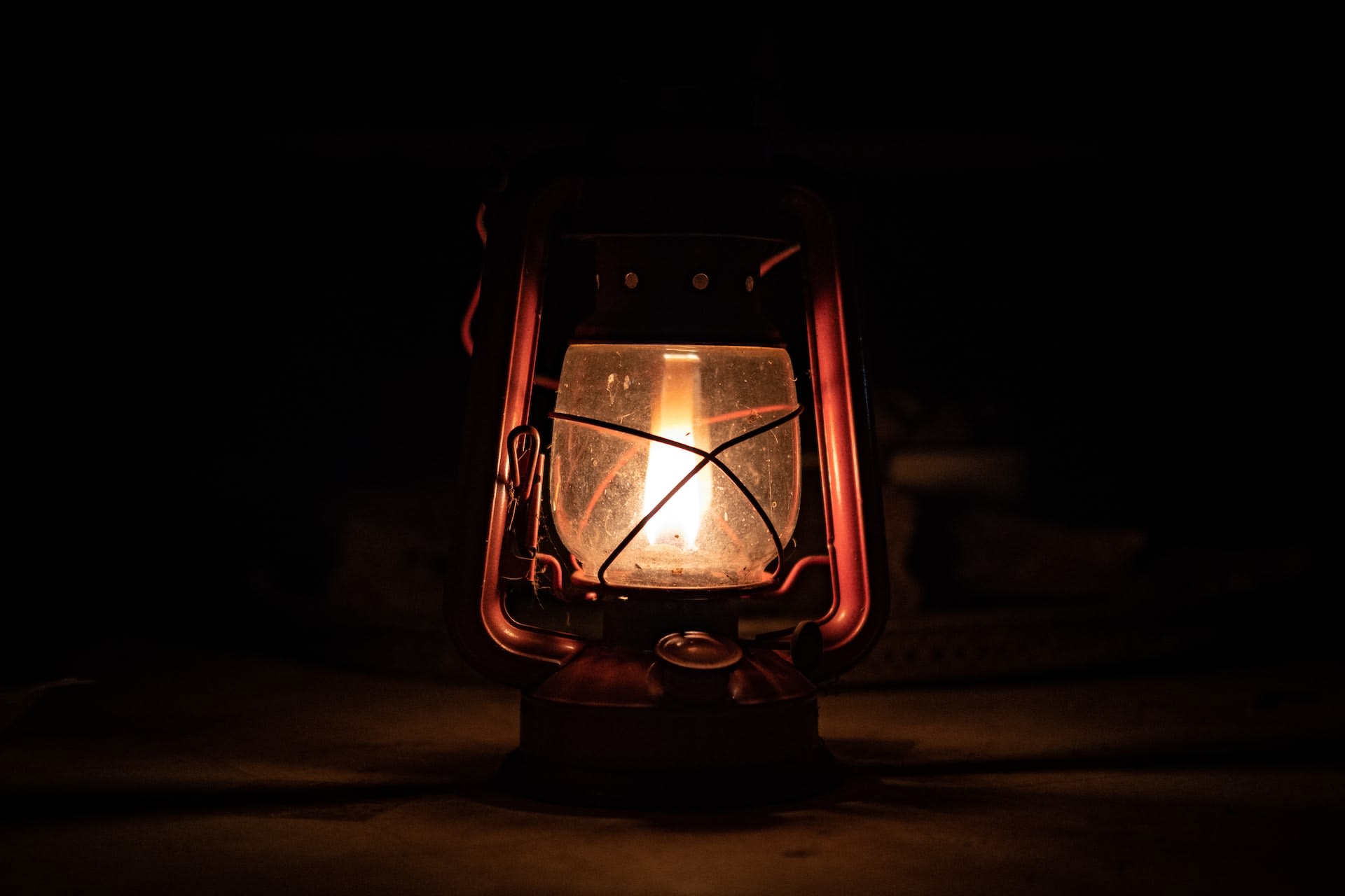 a flame burning in a lantern