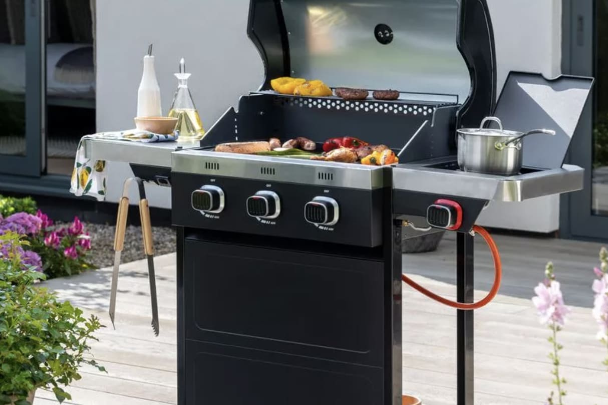 a black and silver gas bbq