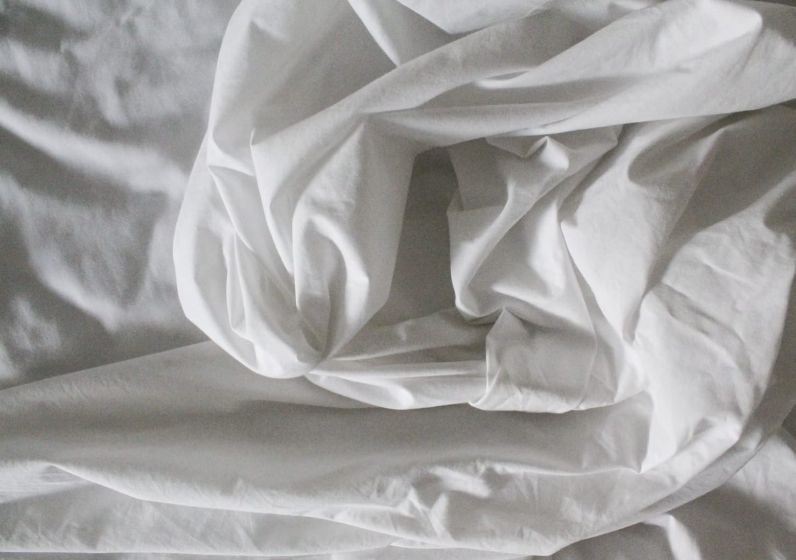 Fresh white bed sheets