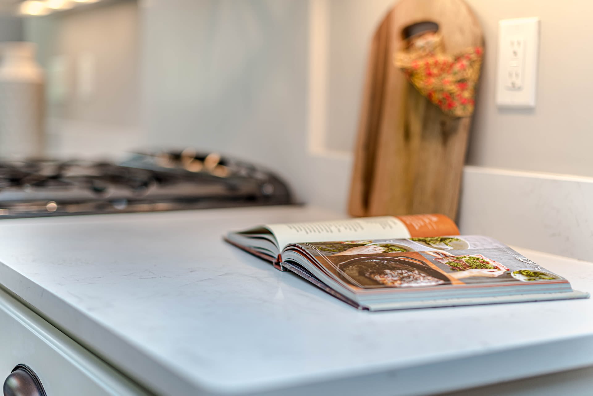 Pre-loved easy student meals cookbook open on kitchen counter