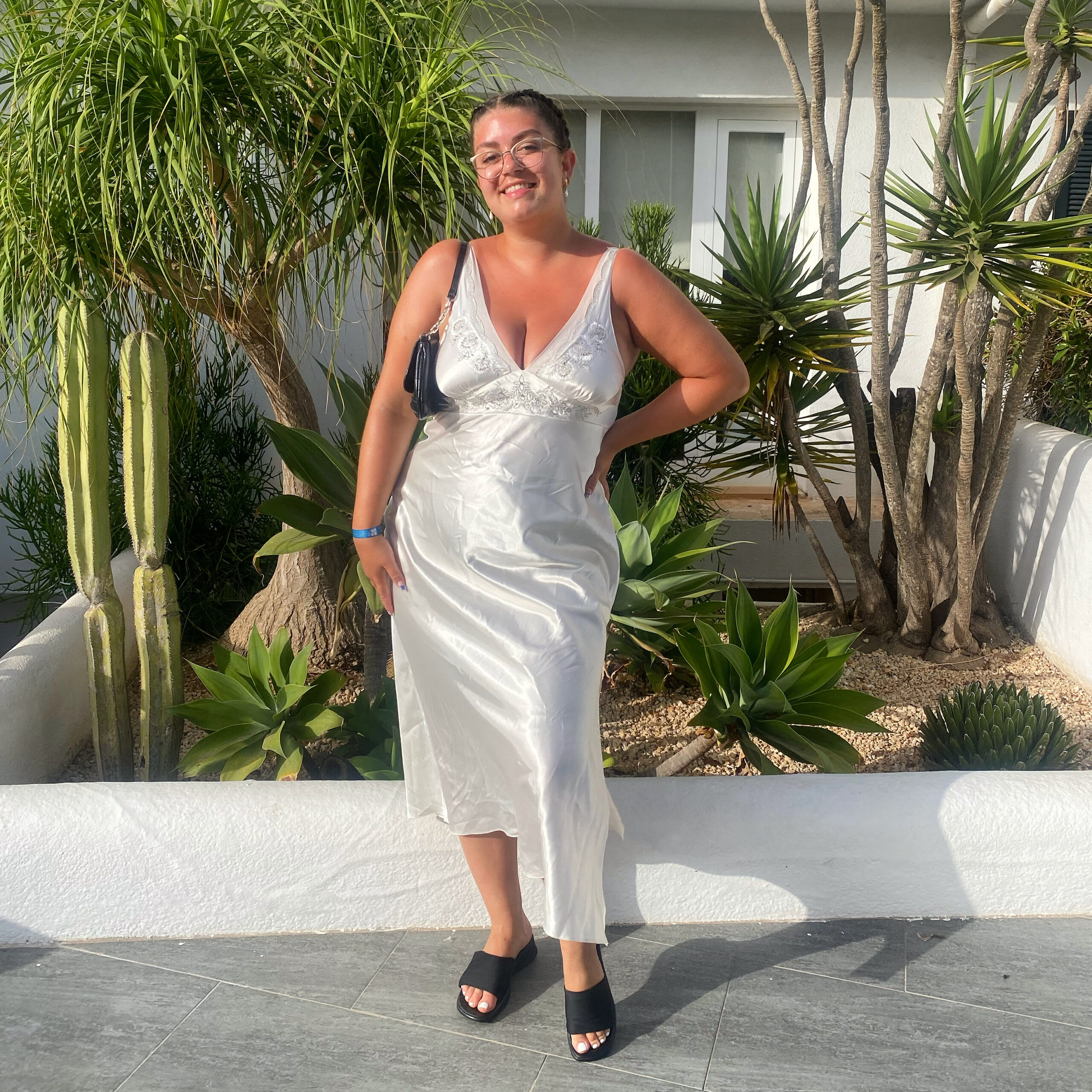 Amy styling a stunning vintage white satin dress for a simple yet elegant evening holiday look.