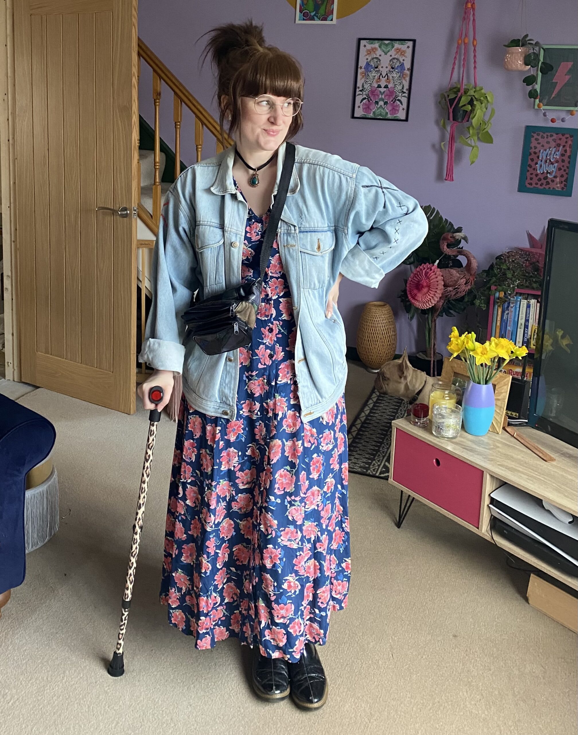 Little Splash wearing a vintage floral dress with 90's grunge accessories