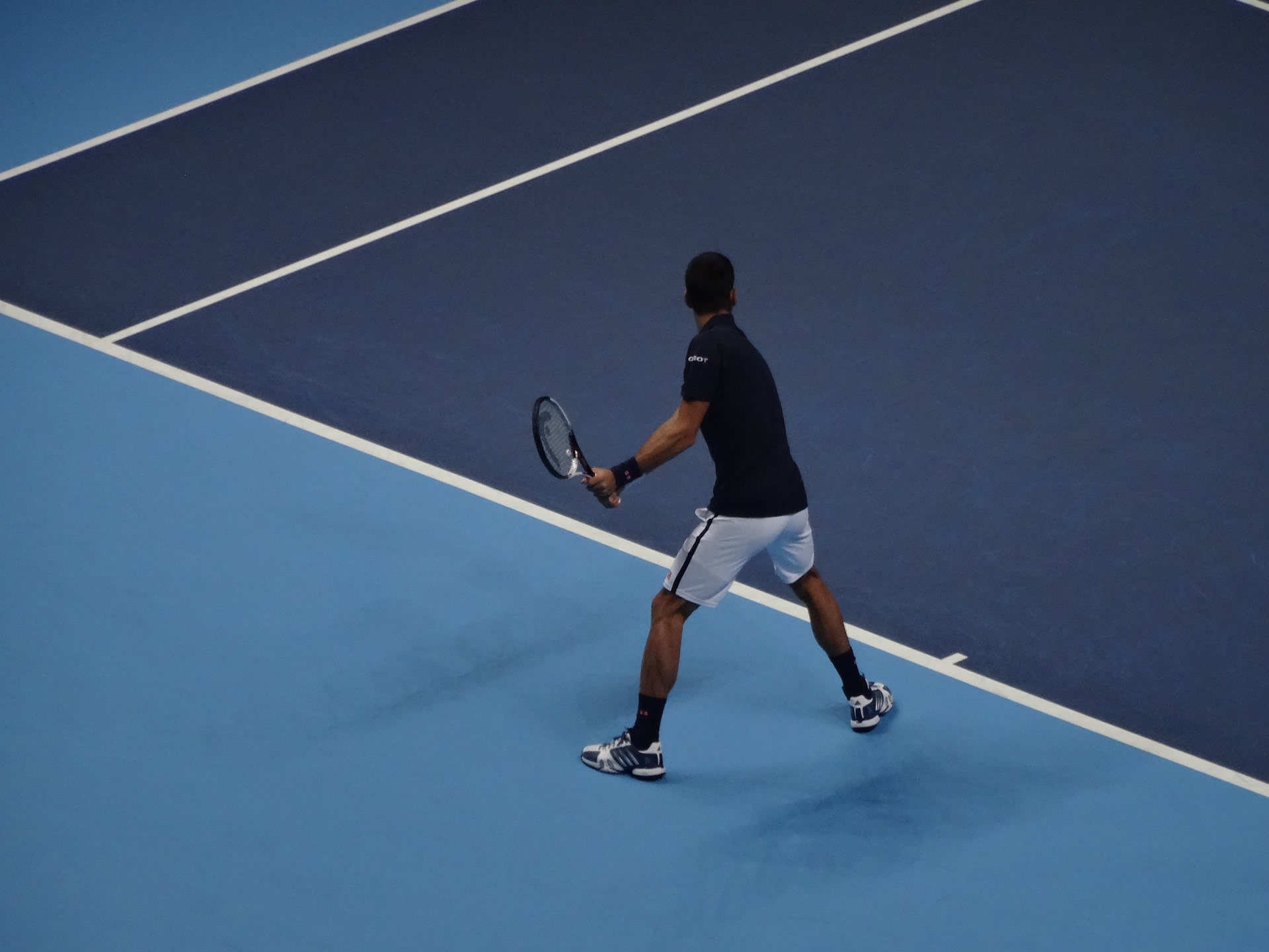 Man wearing white second hand tennis shorts.