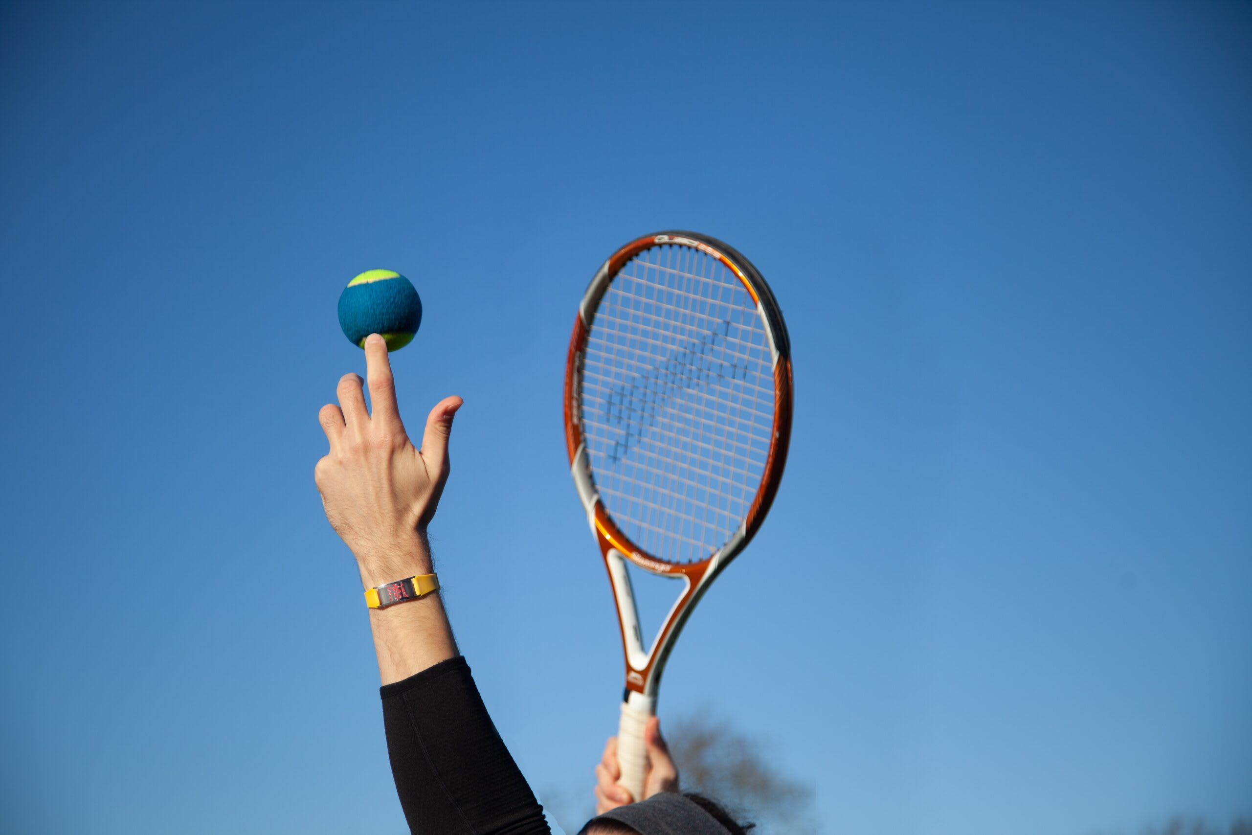 Man using a Slazenger tennis racket.