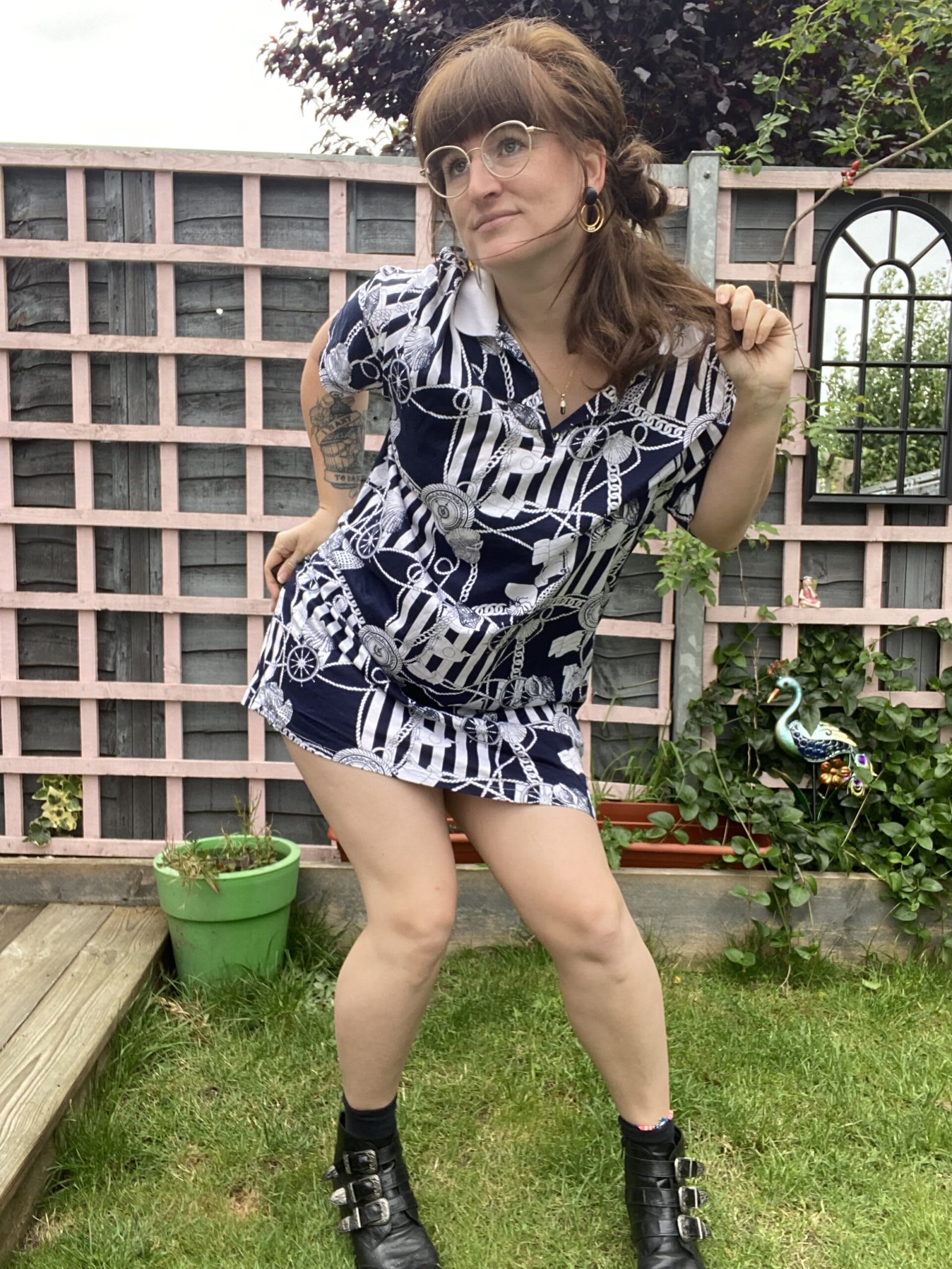 Little splash poses in a vintage print dress