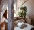 Loading placeholder for Second-hand sofa bed and plant in cosy room