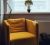 Loading placeholder for Used mustard arm chair in front of window