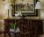 Loading placeholder for Dark wood vintage sideboard in traditionally decorated room