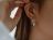 Loading placeholder for Bride wearing second hand classic gold hoops