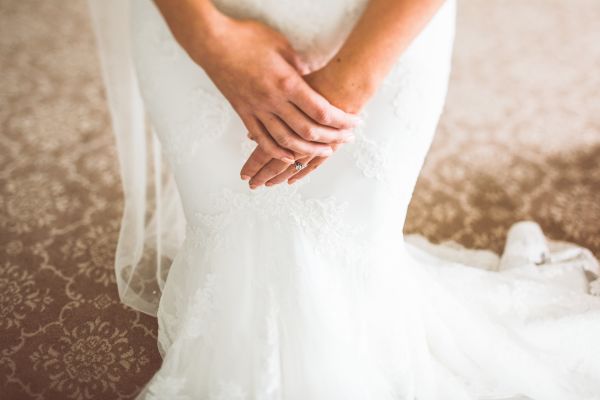 Bride wearing a second hand mermaid style wedding dress