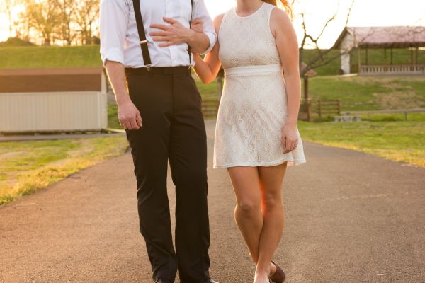 Bride wearing short white wedding dress