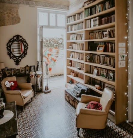 Wooden bookcase in cosy room