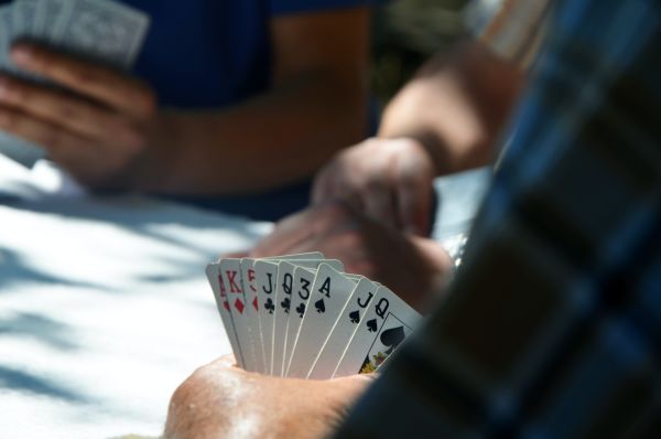 Friends playing card games together