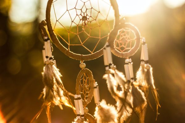 Dreamy picture of a second hand dreamcatcher in the golden hour
