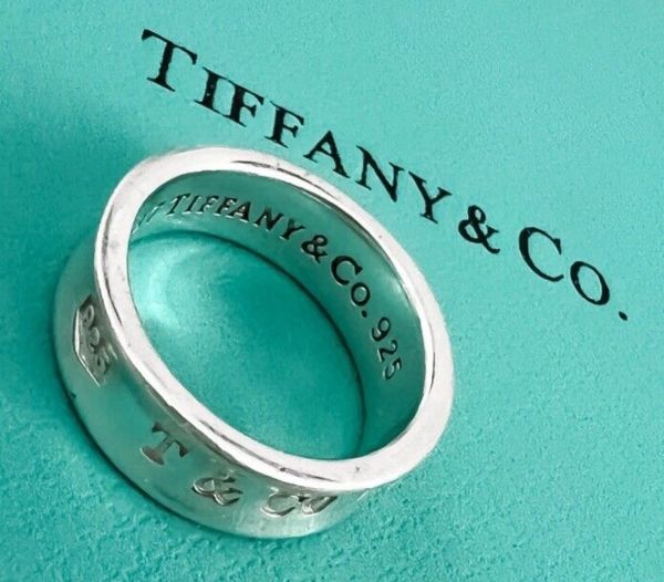 Silver Tiffany &amp; Co Ring with brand mark inside