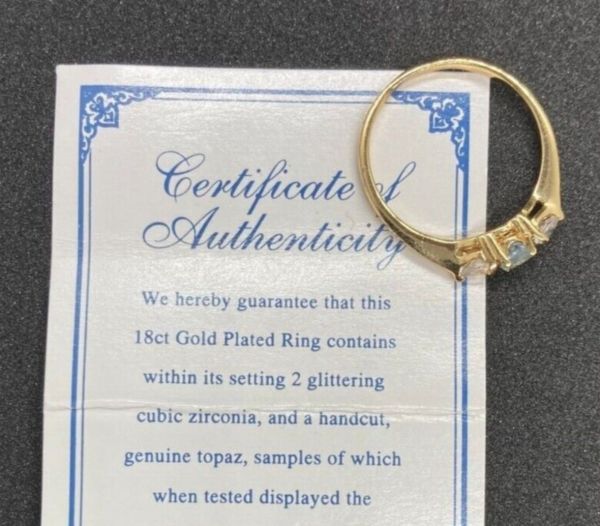 Engagement ring with it's original certificate of authenticity