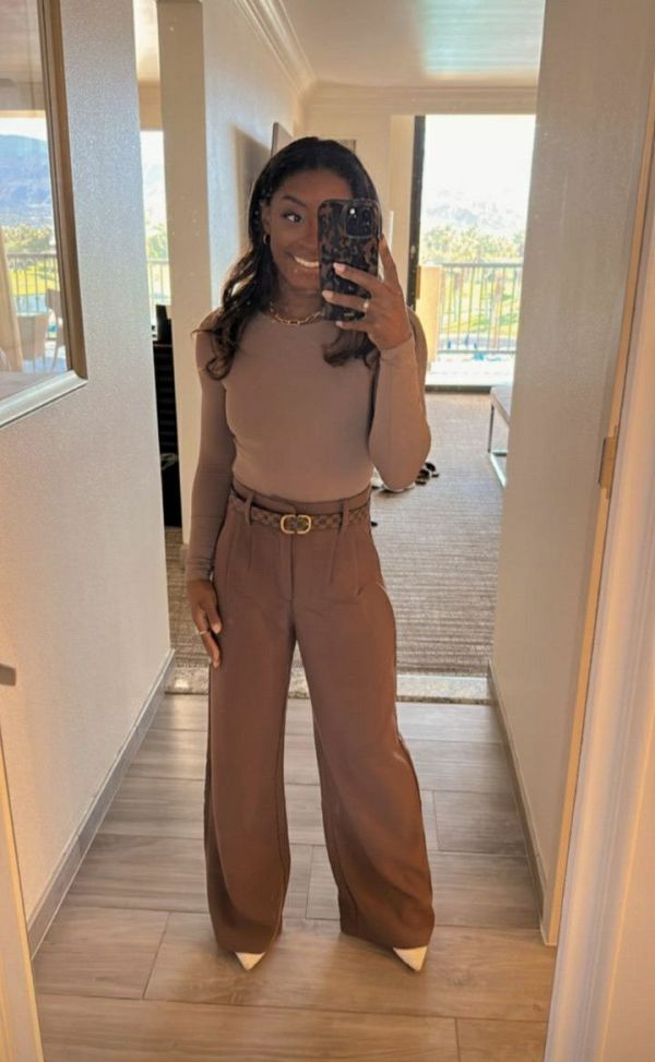 Symone Byles wearing a neutral outfit