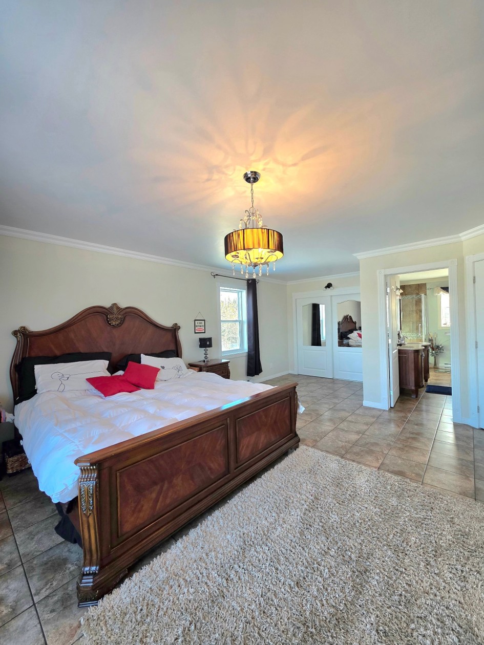Chambre à coucher principale — 111, Route 132 E., Sainte-Luce, G0K1P0, Sainte-Luce