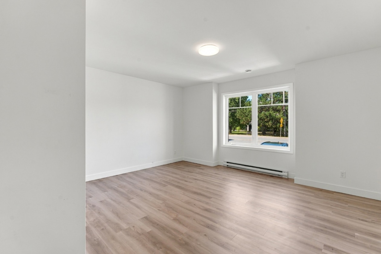 Chambre à coucher principale — 999 - 1003 Rue Principale, Saint-Côme
