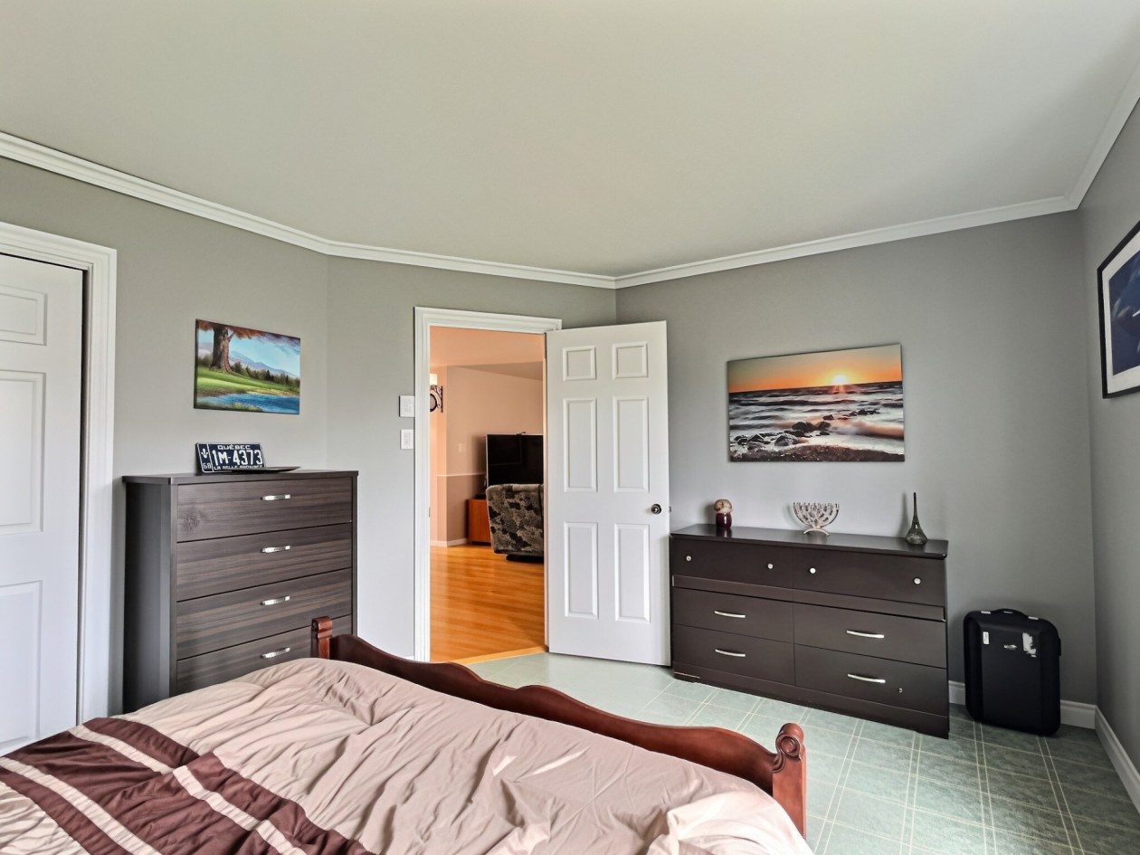Chambre à coucher principale — 15 Rue Ross, Saint-Anaclet-de-Lessard