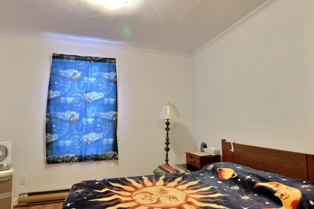 Chambre à coucher principale — 125 - 125C Rue Principale, Esprit-Saint