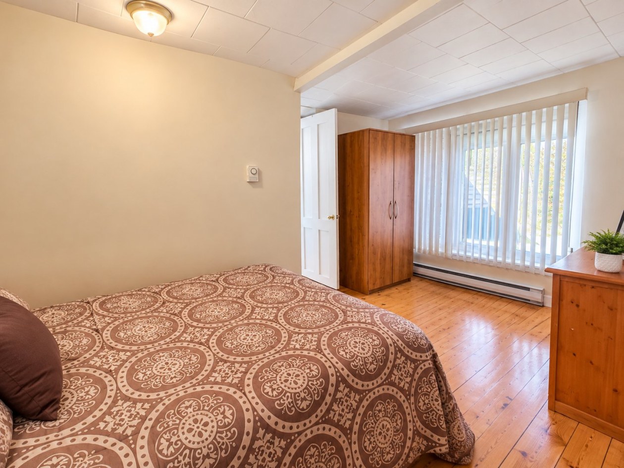 Chambre à coucher principale — 203 Rue du Parc, Grande-Rivière