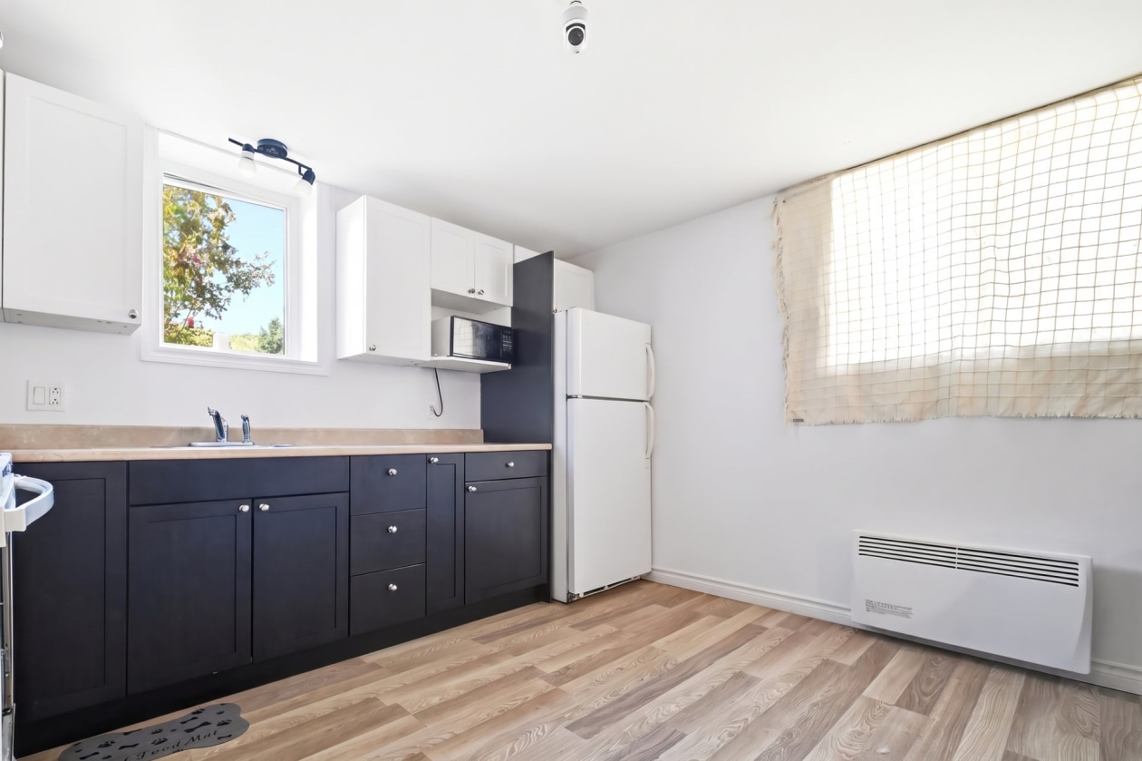 Logement — 15 - 15C Rue St-Jean-Baptiste, L'Anse-Saint-Jean